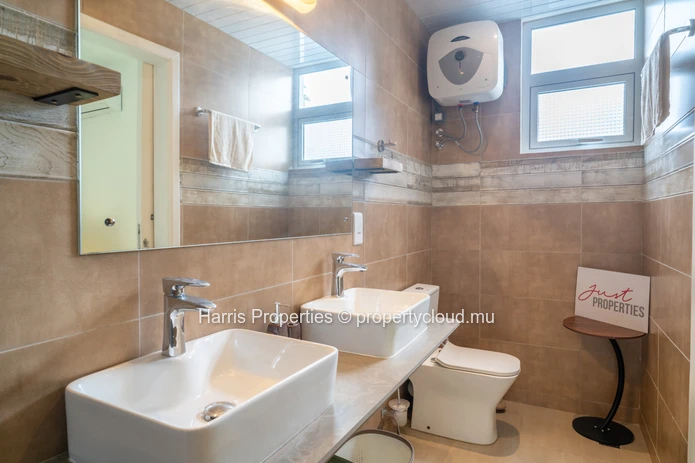 Stunning beachfront apartment located within a secure complex in Trou d’Eau Douce available for rent