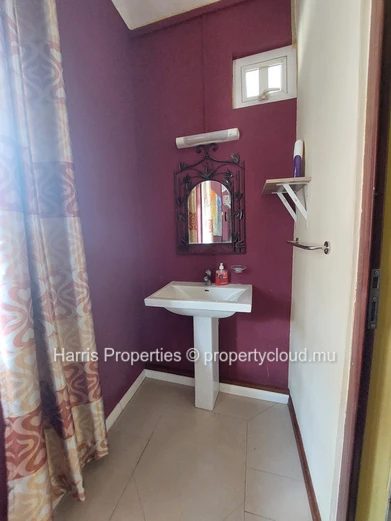 Stylish second-floor penthouse for sale in Pointe aux Piments.